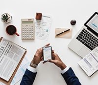 Financial documents and planning materials on a desk