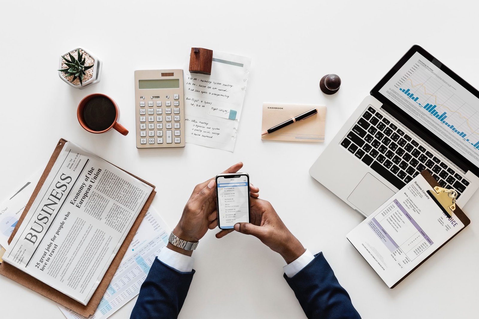 Documents and laptop arranged for financial planning